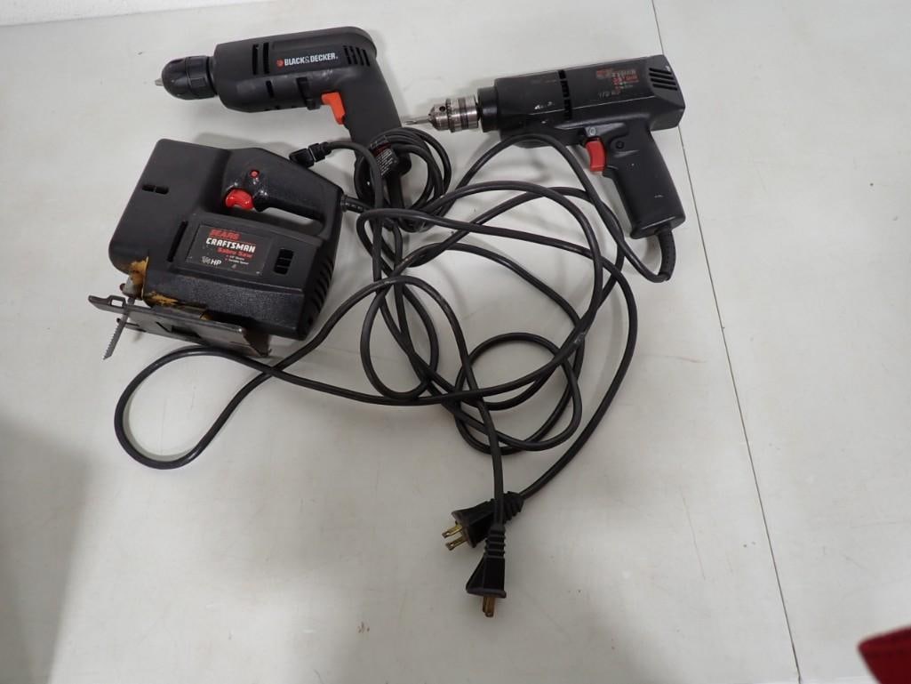 3 Assorted Power Tools - Craftsman Saw and Drill, Black & Decker Drill - all turned on when plugged (1 of 7)
