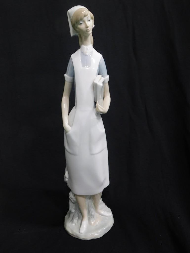 Lladro #4603 "Nurse" 15" Porcelain Figurine with Glossy Finish: Lladro #4603 "Nurse" 15" Porcelain Figurine with Glossy Finish Condition: no chips or cracks