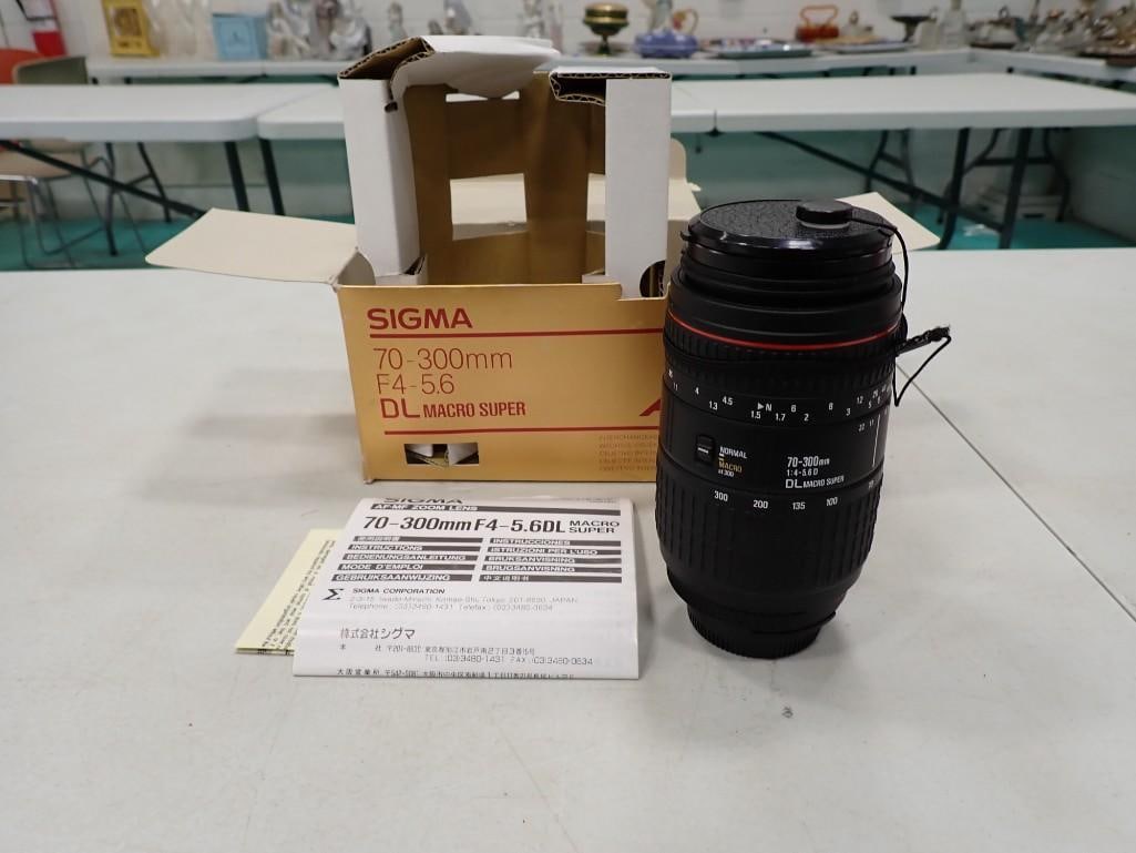 Sigma 70-300 Camera Lens New in Box: Sigma 70-300 Camera Lens New in Box, With box and paperwork. Never used