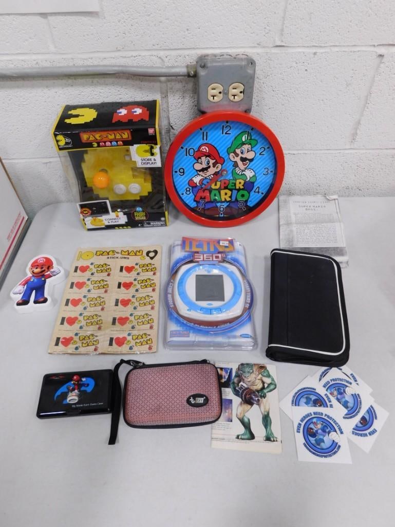 Video Game Lot including Pac Man, Super Mario Clock, Stickers, Tetris 360, Mega Man, My Mario Kart G (1 of 6)