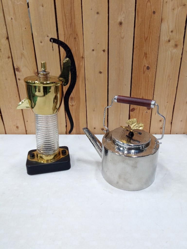 Michael Aram Butterfly Ginko Teapot or Tea Kettle and A Water Pump Carafe: Michael Aram Butterfly Ginko Teapot or Tea Kettle and A Water Pump Shaped Carafe Michael Aram Tea Kettle appears unused and has the original paper inside