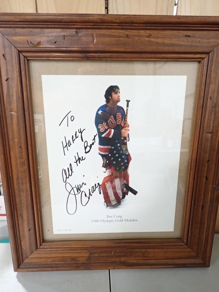 Jim Craig US 1980 Olympic Hockey Autographed Framed Picture with Picture of boy on the back: Jim Craig US 1980 Olympic Hockey Autographed Framed Picture with Picture of boy on the back. No COA
