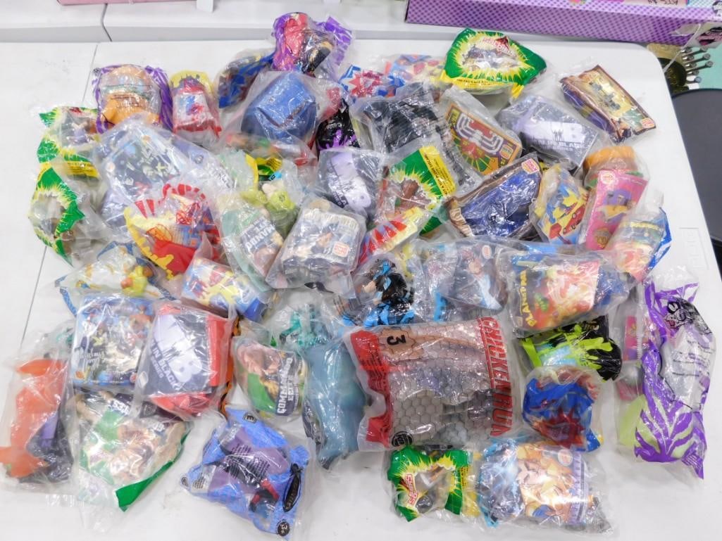 50 McDonald's & Burger King Happy Meal, Marvel, etc NIP Lot: Approximately 50 McDonalds and Burger King Happy Meal Toys including Men in Black, Small Soldiers, Flintstones Rock Vegas, Chicken Run, Marvel, Superman, etc Lot. Most new and sealed.