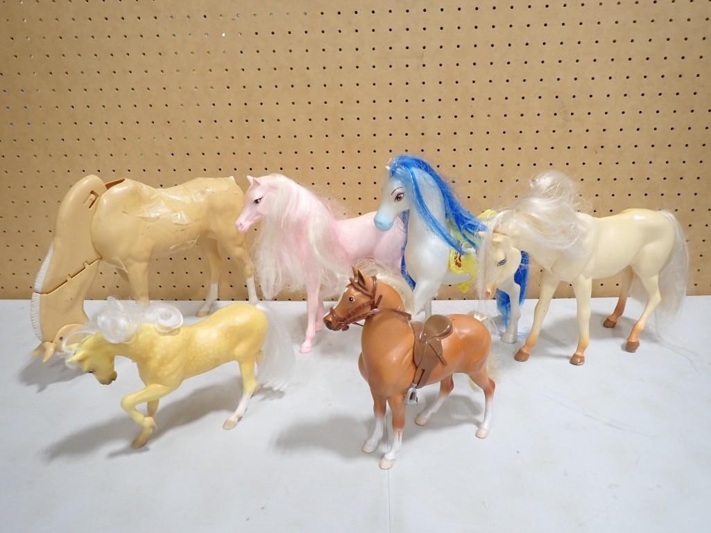 Plastic Toy Horses incl Barbie Dreamhorse Rosebud, etc: Plastic Toy Horses incl Barbie Dreamhorse Rosebud, etc Condition: horse with the jointed neck has had it's tail broken off. It also has tape all around it, which I'm not sure if it is holding 