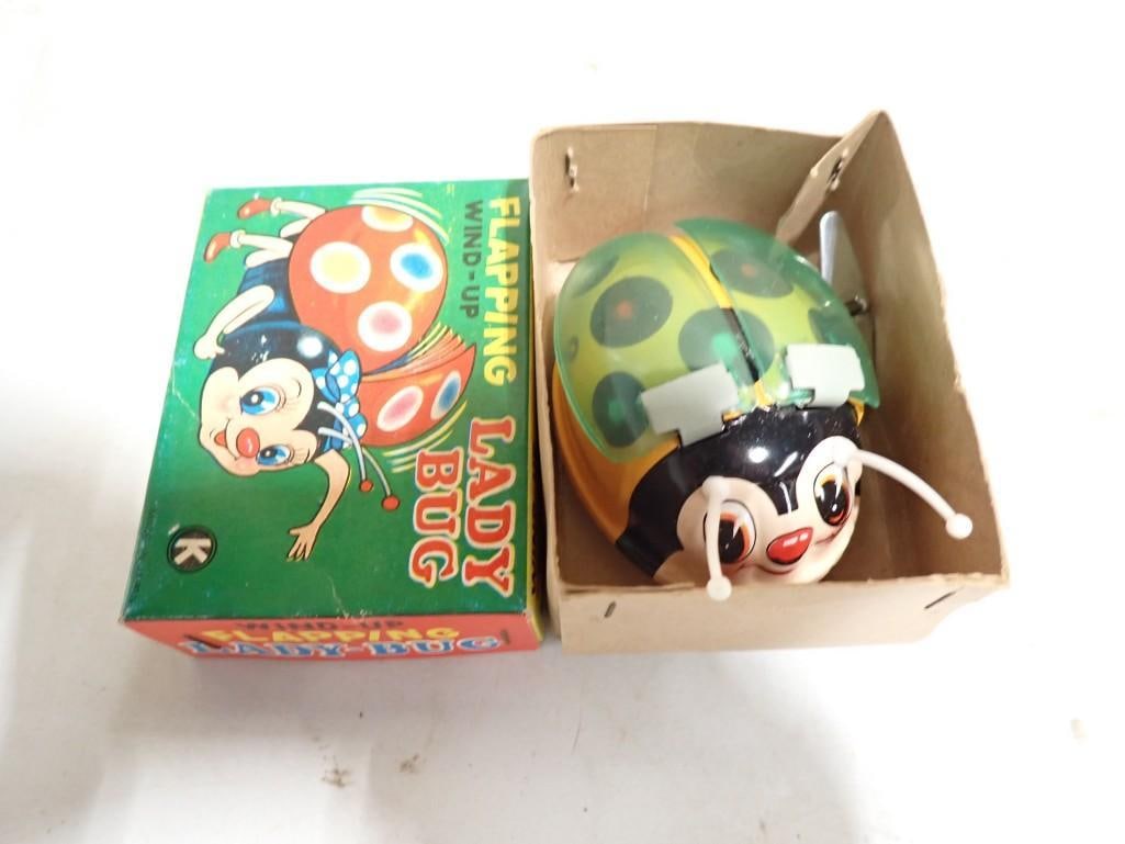 Vintage Tin Toy Wind Up Flapping Lady Bug Made in Japan in Original Box: Vintage Tin Toy Wind Up Flapping Lady Bug Made in Japan in Original Box . Does not work right