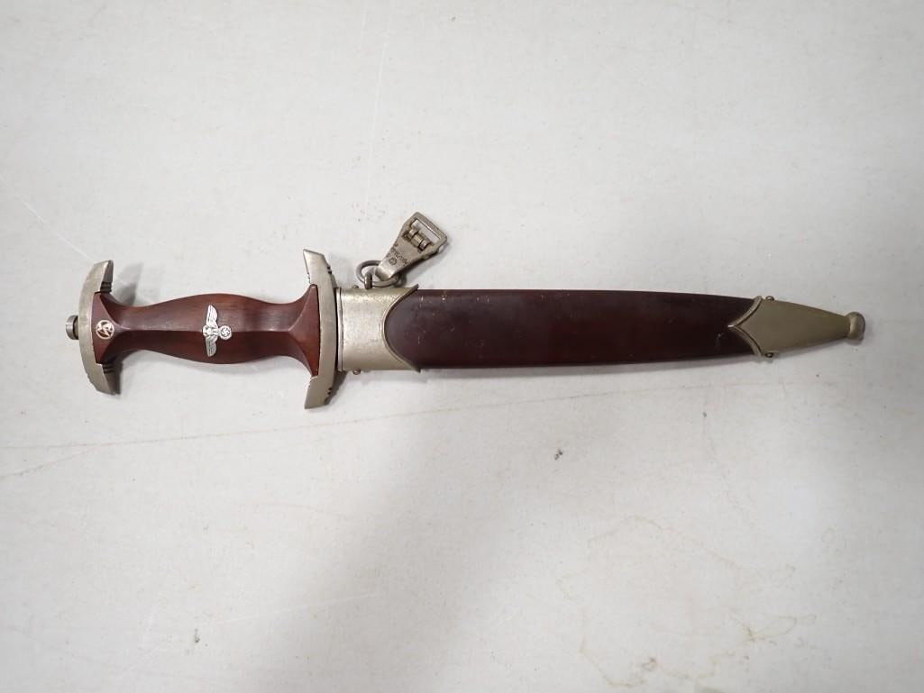 World War II German Dagger with 9" blade: World War II German 3rd Reich Dagger with 9" blade. Blade is etched with "Alles Fur Deutschland" (Everything for Germany)