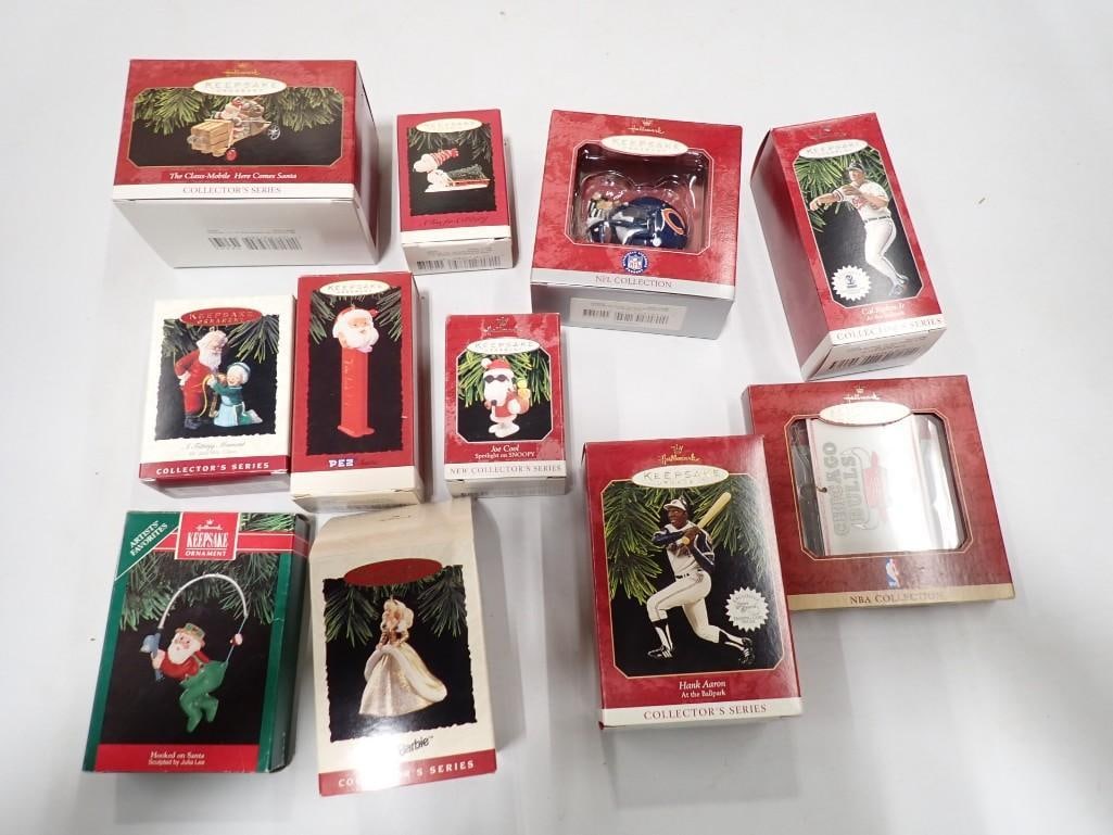 Assorted Hallmark Keepsake Ornaments including Santa Pez, Chicago Bears, Hank Aaron, Cal Ripken Jr. (1 of 4)