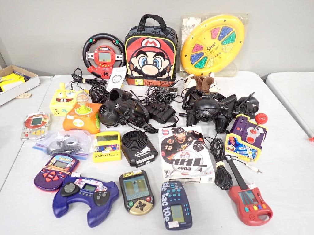 Assorted Game / Toy Lot including Simon, Mario Bag, Sponge Bob Video Game, Namco, Hangman (1 of 11)