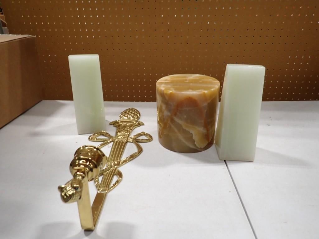 Polished Marble Book Ends, a cylinder, and a brass wall sconce (1 of 4)