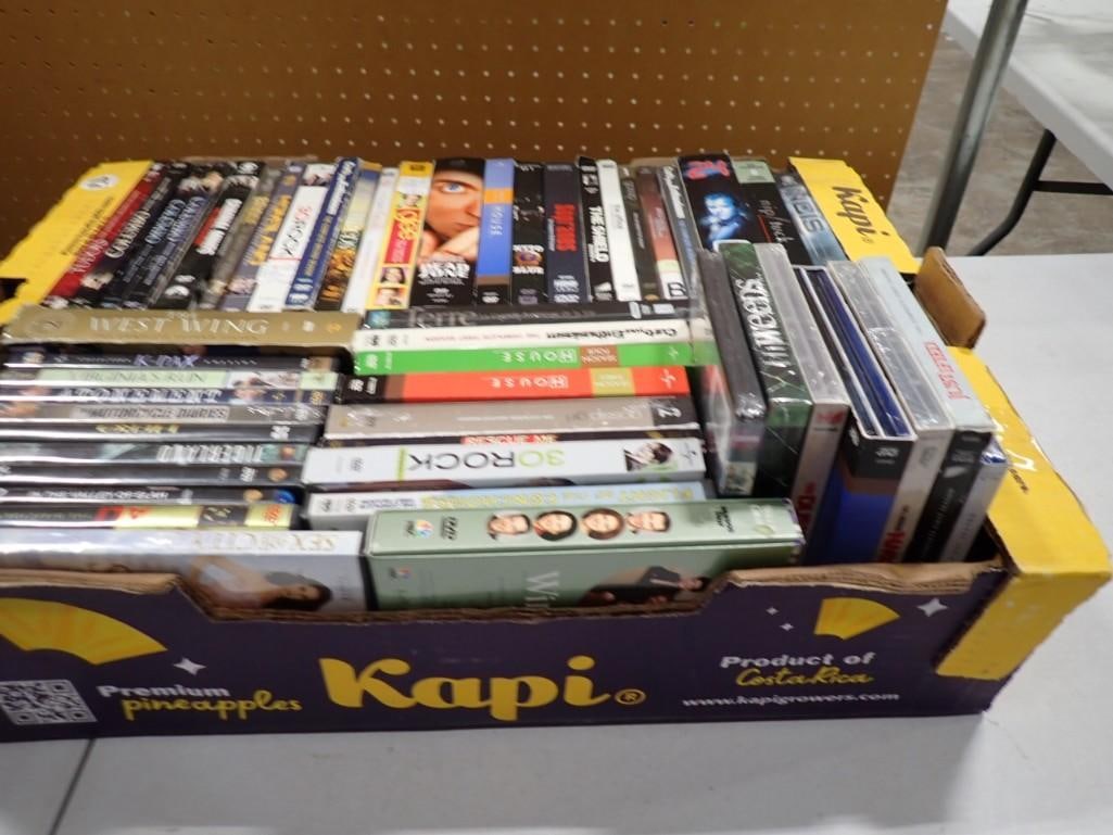 Large Box full of assorted DVDs including TV series - 30 Rock, West Wing, Weeds, NCIS, Columbo (1 of 6)