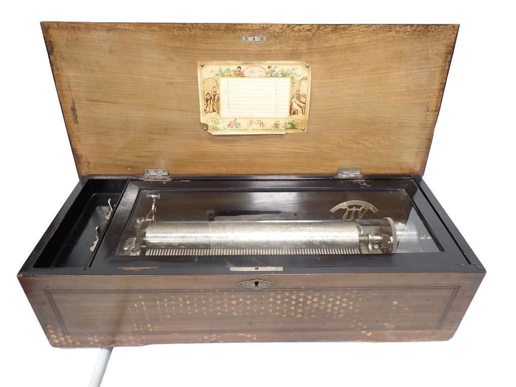 Antique Cylinder Music Box Works Plays Several Songs: Antique Cylinder Music Box, Works, Plays Several Songs Condition: it works, it plays several songs. It does have some scuffs and dings to the wood. Please see all pictures