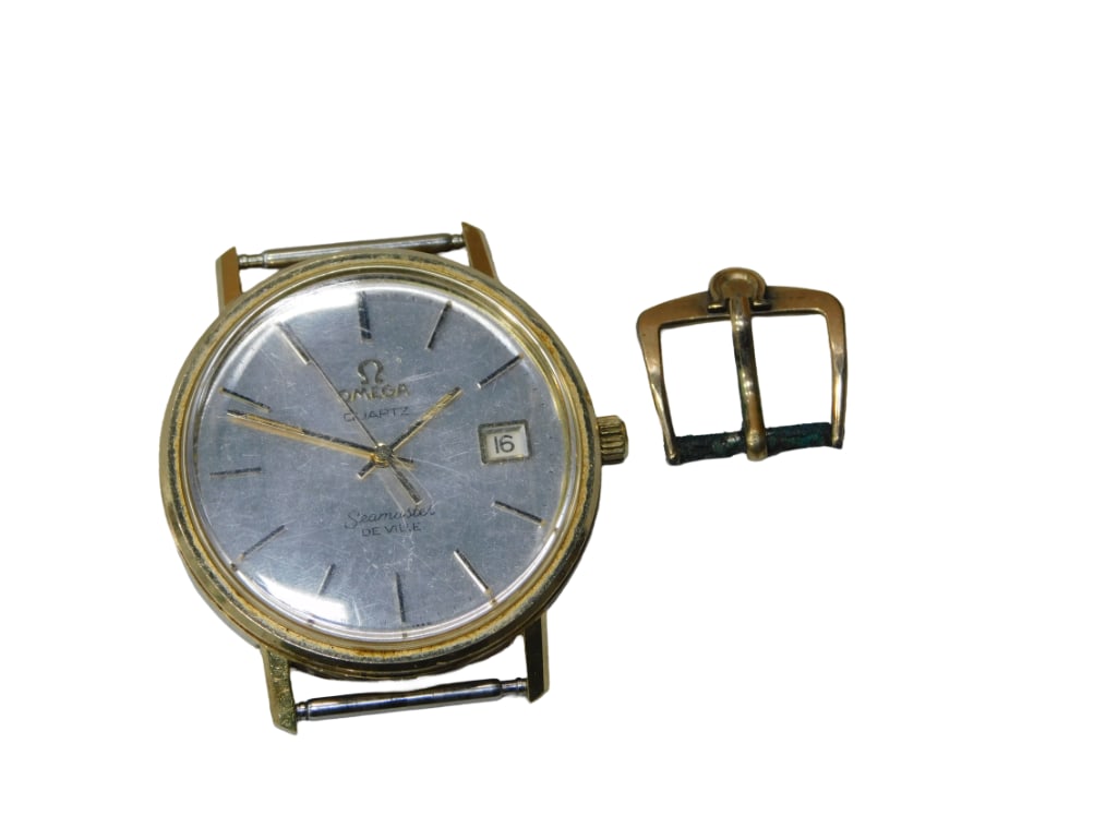 Omega Gold-Filled Seamaster Deville; 7 Jewel Quartz Movement 1342.: Omega Gold-Filled Seamaster Deville; 7 Jewel Quartz Movement 1342. Interior of case numbered 1960075". With an Omega buckle. Diameter including stem: 35.5mm
