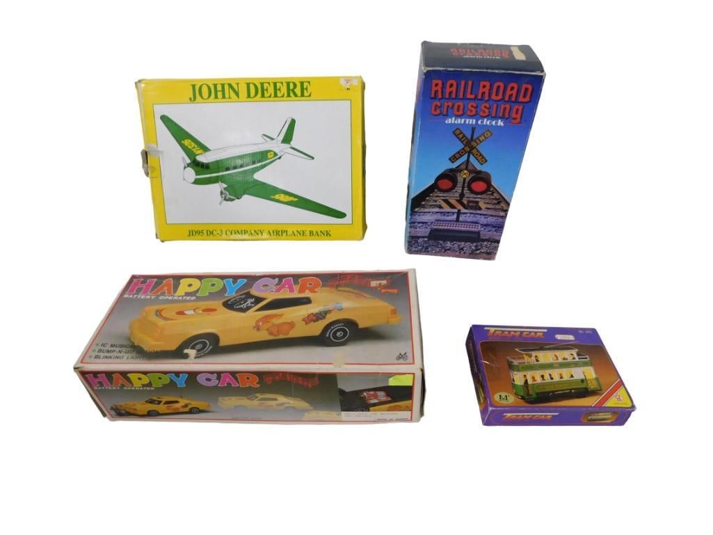 Toy Lot including John Deer Airplane Bank, Happy Car with Bump N' Go Action, Railroad alarm clock (1 of 4)