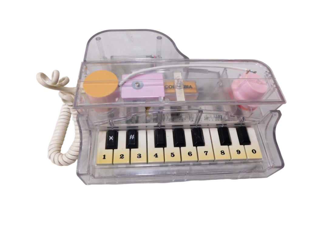 Vintage Piano Touch Tone Phone Telephone with the Keys as the Buttons: Vintage Piano Touch Tone Phone Telephone with the Keys as the Buttons Condition: untested, has some discoloration and/or grime on the keys