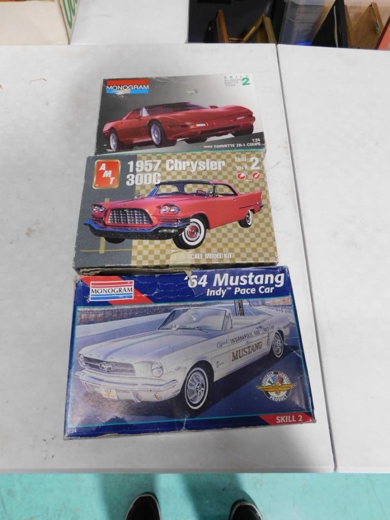 3 Model Car Kits incl '64 Mustang, '92 Corvette ZR1, '57 Crysler 300c: 3 Model Car Kits incl '64 Mustang, '92 Corvette ZR1, '57 Crysler 300c. All open, includes everything that you see in the pictures