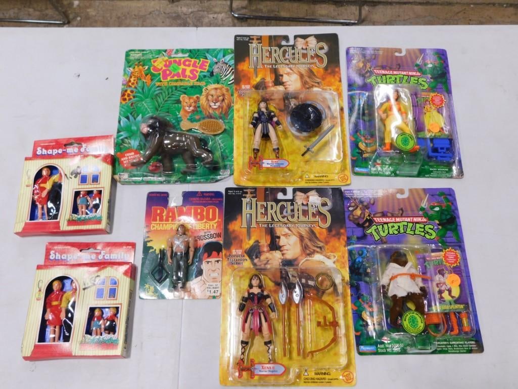 New in Package Action Figures, etc. including Rambo, TMNT, Hercules, Jungle Pals, Shape-Me Family (1 of 7)