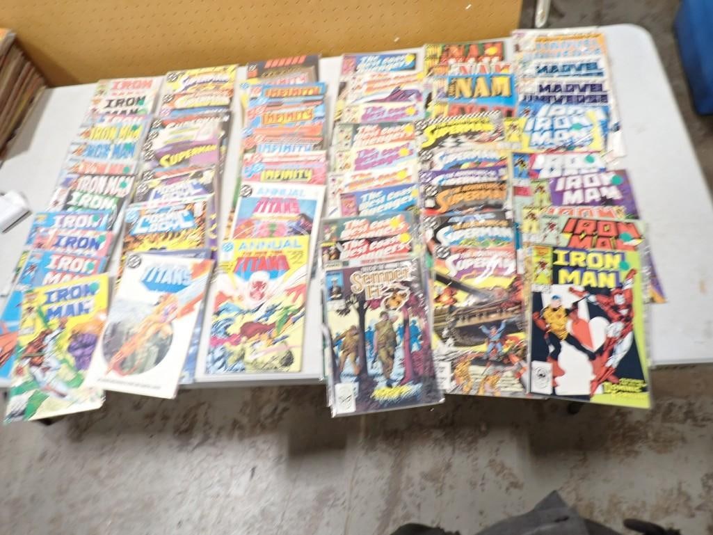 Vintage and newer comic books including Iron Man, Superman, Teen Titans, Marvel Universe, West (1 of 12)
