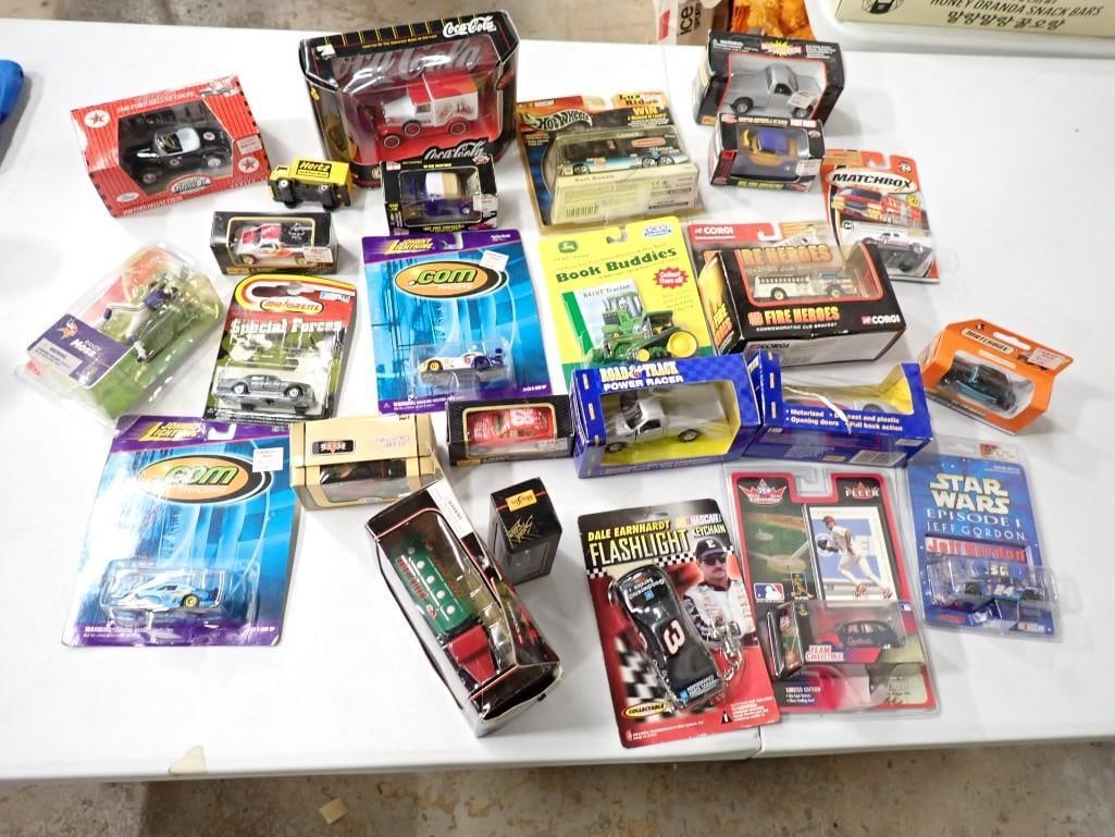 Assorted New in Package Cars, etc. including Johnny Lightning, John Deere, Coca Cola, Texaco, Corgi, (1 of 11)