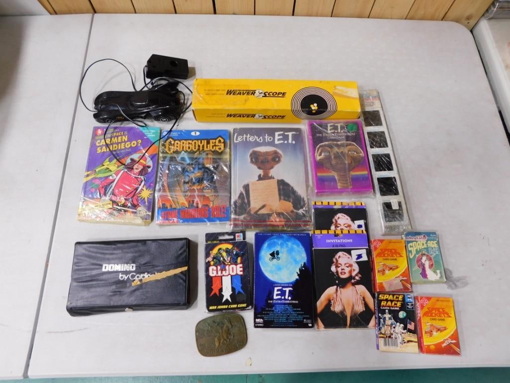 Misc. Lot including E.T. Movie, Books, Card Games, Marilyn Monroe, Carmen Sandiego, Smith & Wesson (1 of 8)
