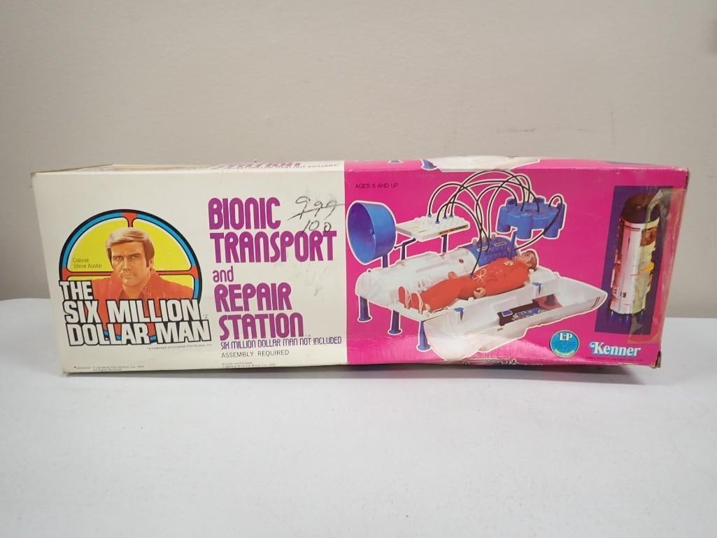 Vtg 1970s The Six Million Dollar Man Bionic Transport and Repair Station In Original Box: Vtg 1970s The Six Million Dollar Man Bionic Transport and Repair Station in original box. Has some writing and tape on the box