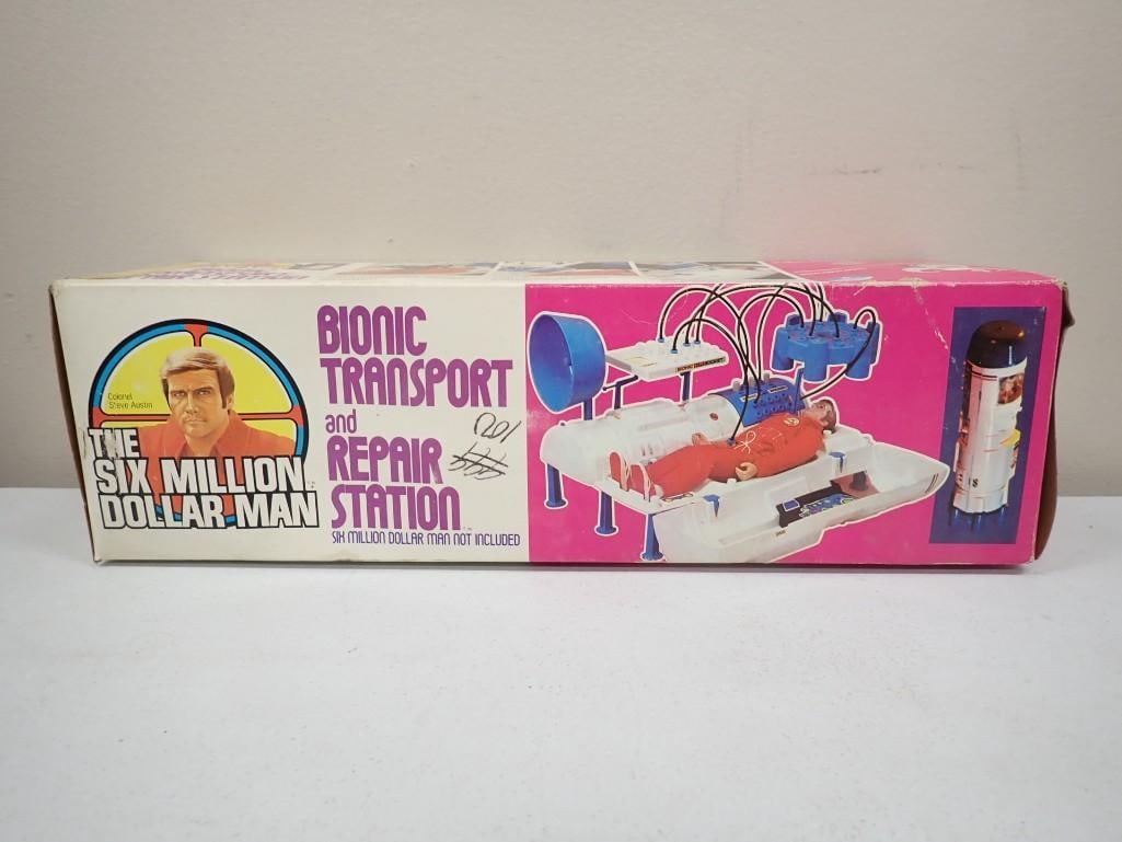 Vtg 1970s The Six Million Dollar Man Bionic Transport and Repair Station In Original Box: Vtg 1970s The Six Million Dollar Man Bionic Transport and Repair Station in original box. Has some writing and tape on the box