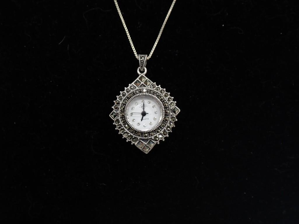 Sterling Silver Watch with Marcasite: Sterling Silver Watch with Marcasite Condition: does not work, but did not try putting a new battery in