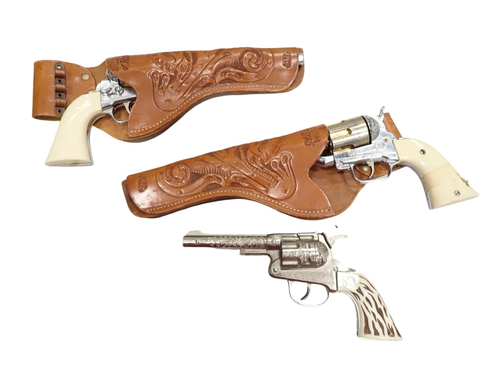 Lot of 3 Cap Guns Hand Tooled Holsters Hubley: 2 Hubley Texan .45, These need repair. Plus a Marshall