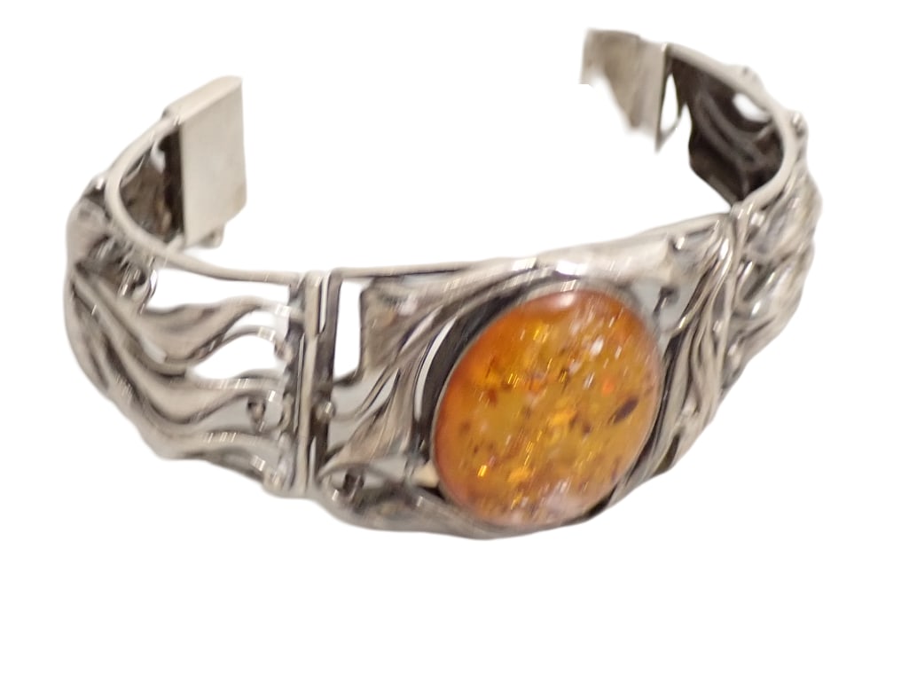 Vintage Art Nouveau Sterling Silver and Amber Bracelet: Vintage Art Nouveau Sterling Silver and Amber Bracelet 70 grams total weight. Stone measures approximately 1 1/2" x 1 1/4"