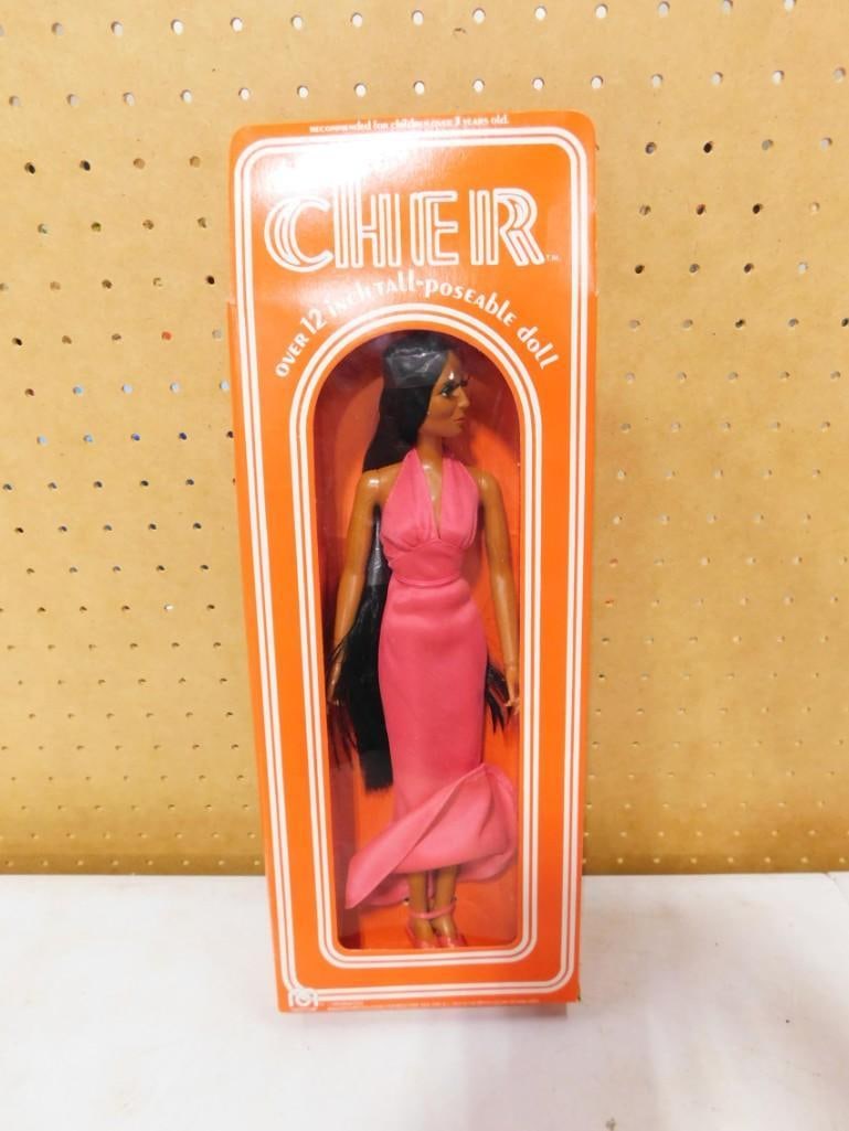 Vtg 1976 Cher Poseable Doll in Original Box by Mego Approx 12" Tall: Vintage 1976 Cher Poseable Doll in Original Box by Mego. Approximately 12" tall. Condition: She is new old stock and has not been removed from the box.