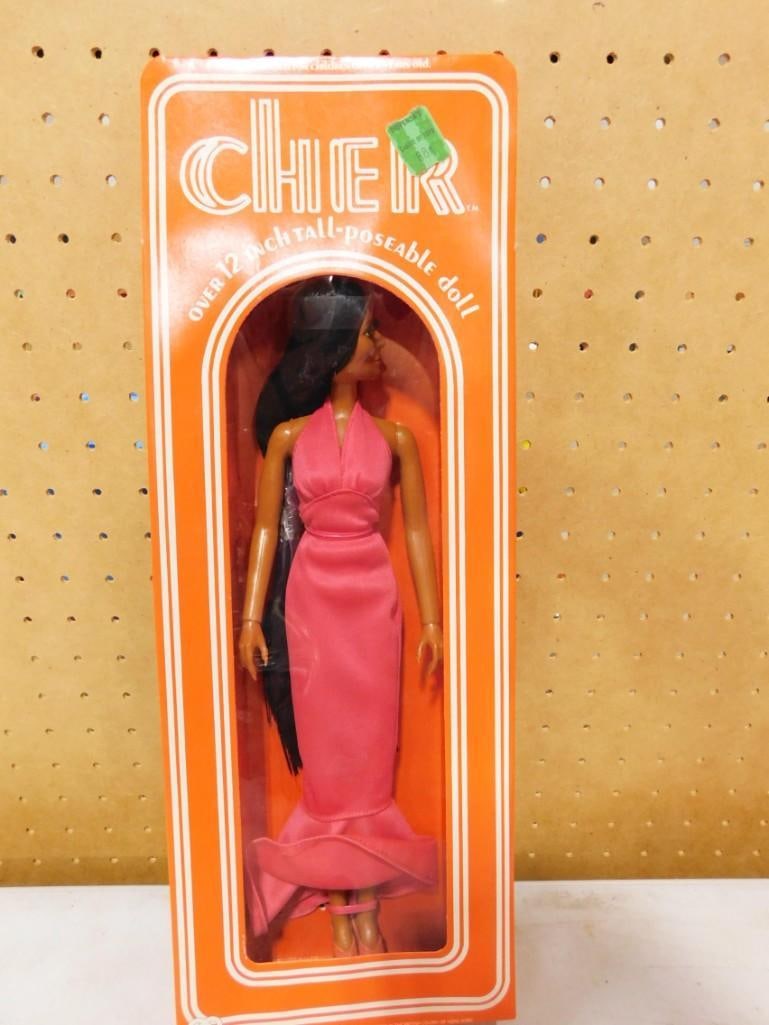 Vtg 1976 Cher Poseable Doll in Original Box by Mego Approx 12" Tall: Vintage 1976 Cher Poseable Doll in Original Box by Mego. Approximately 12" tall. Condition: She is new old stock and has not been removed from the box.