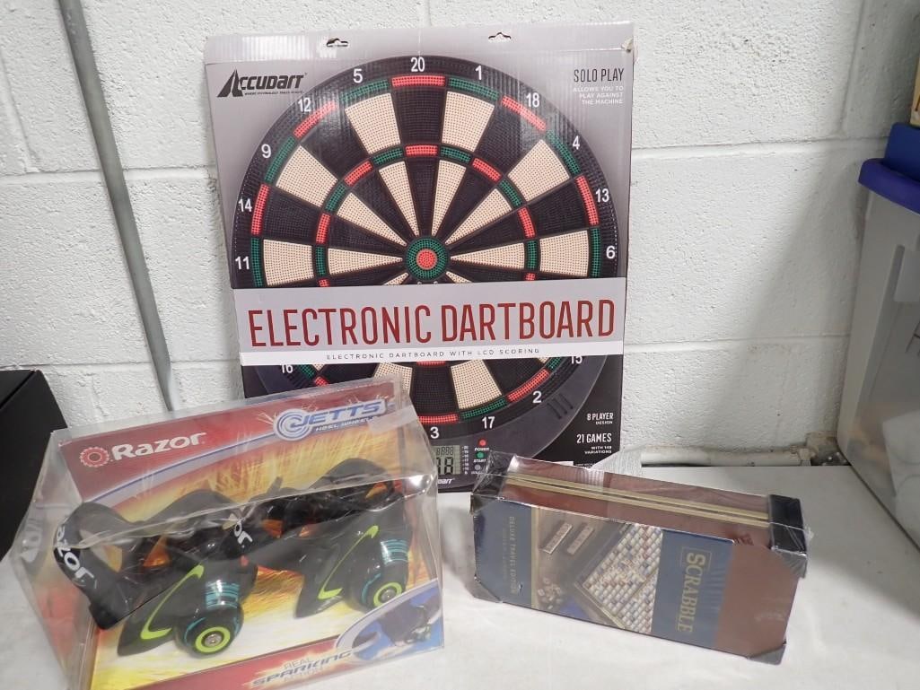 New in package items including Electronic Dartboard, Razor Jetts, Scrabble Board Game (portable) (1 of 8)