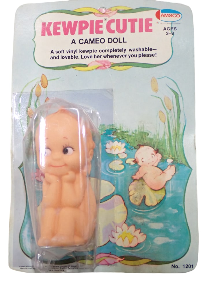 Vintage Kewpie Cutie A Cameo Doll Amsco New Old Stock 1974 Milton Bradley: Vintage Kewpie Cutie A Cameo Doll Amsco New Old Stock 1974 Milton Bradley . Package has some bending and wear
