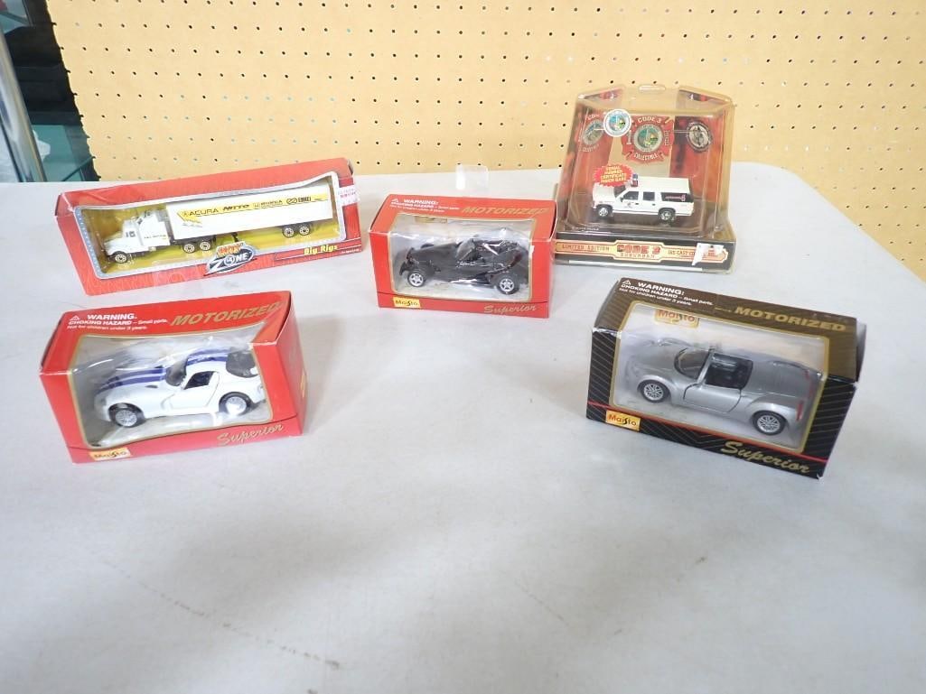 Model Cars new in package including Maisto, Hot Zone Big Rigs, Code 3 Suburban Die-Cast Ambulance (1 of 3)