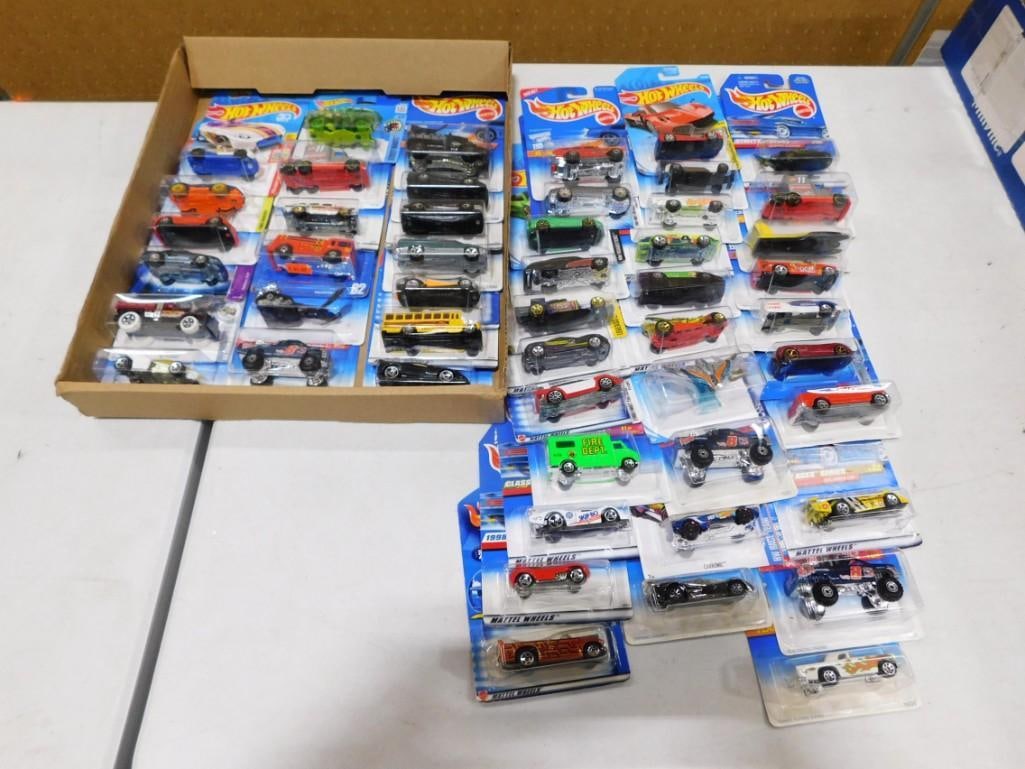 Hot Wheels Cars and Vehicles New in Package Approx 50: Lot of approximately 50 Hot Wheels cars and vehicles New in package