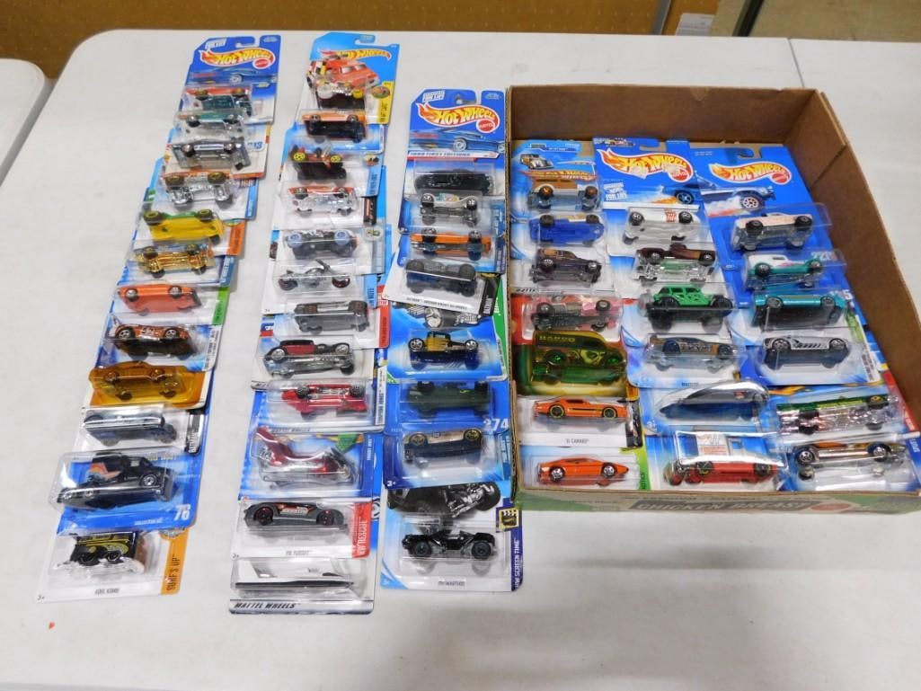 Hot Wheels Cars and Vehicles New in Package Approx 50: Lot of approximately 50 Hot Wheels cars and vehicles new in package