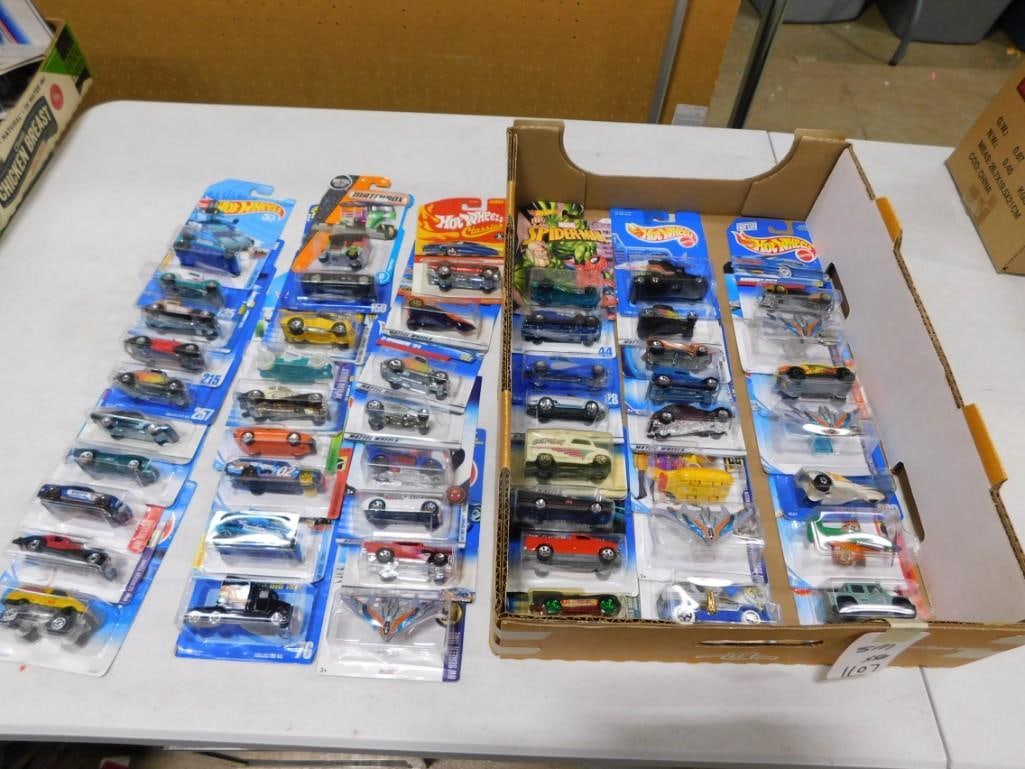 Hot Wheels Cars and Vehicles New in Package Approx 50: Lot of approximately 50 Hot Wheels cars and vehicles new in package