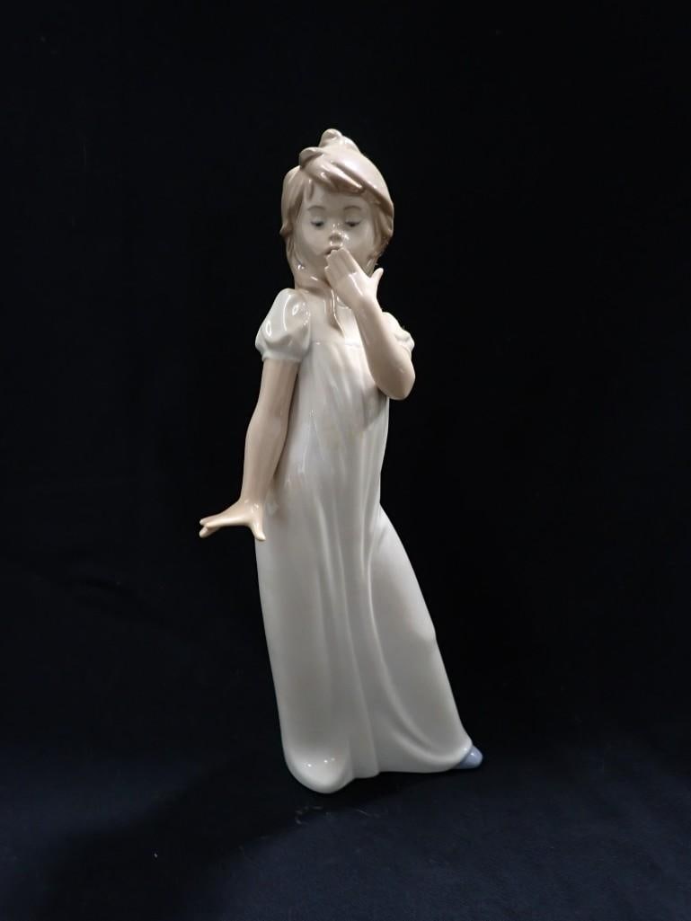 Nao by Lladro Young Girl Yawning Porcelain Figurine: Nao by Lladro Young Girl Yawning Porcelain Figurine