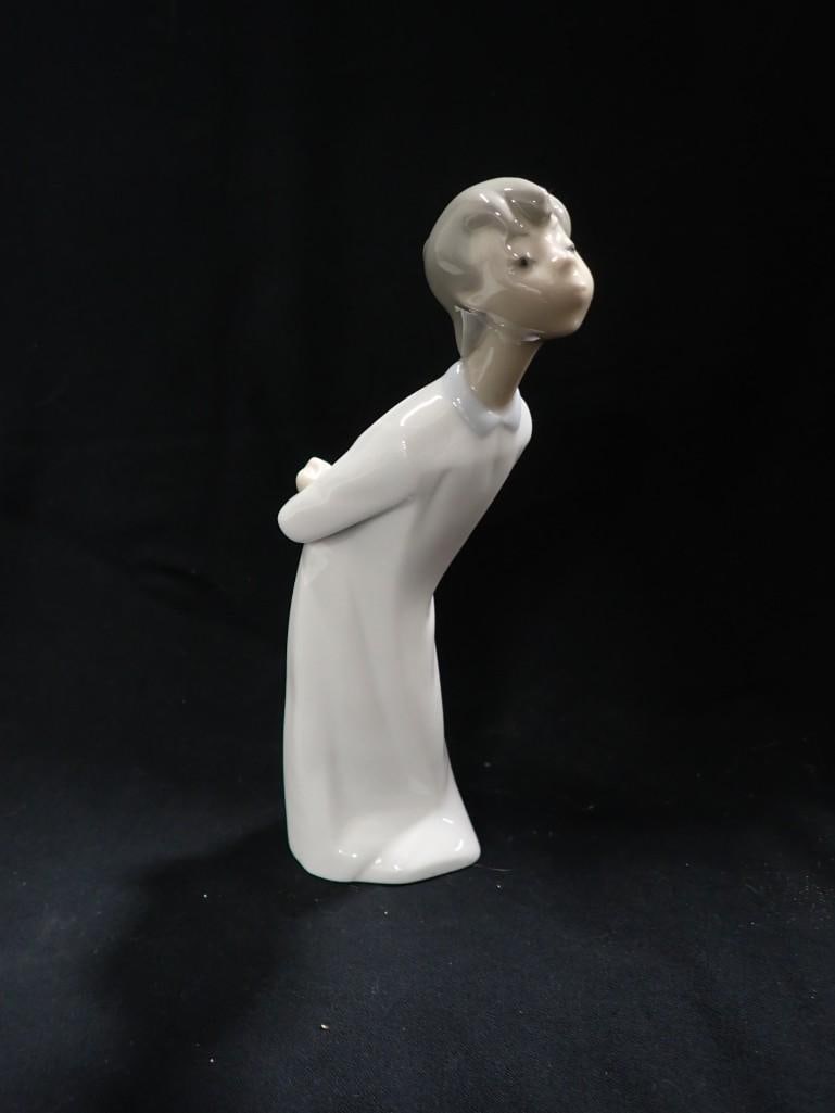 Lladro Boy Blowing a Kiss Porcelain Figurine: Lladro Boy Blowing a Kiss Porcelain Figurine