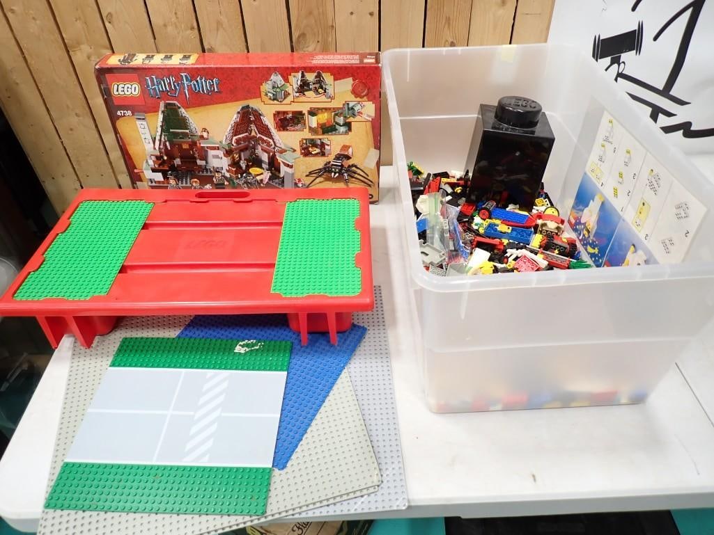 Bin full of Lego pieces, accessories, etc.  Sets may not be complete (1 of 7)
