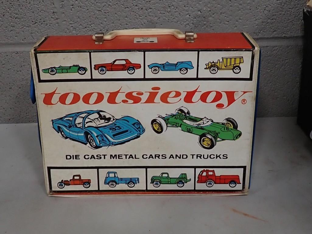 Vintage Tootsie Toy Carrying Case with a bunch of cars. Case is marked 1968: Vintage Tootsie Toy Carrying Case with a bunch of cars. Case is marked 1968. There is big Amaco sticker on one side of the case