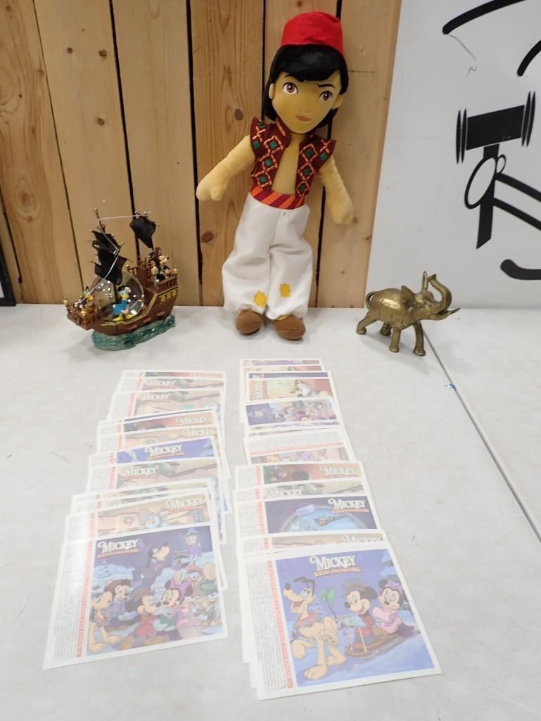 Misc. Lot including Walt Disney Aladdin Plush, Brass Elephant, Disney Boat, French Disney Cards (1 of 6)