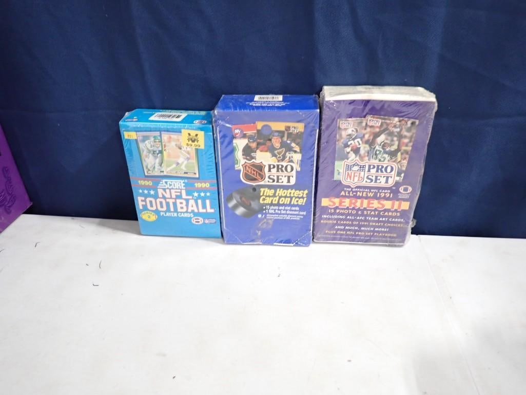 3 Factory Sealed Boxes of Sports Cards incl 1990 Score NFL Football, NHL Pro Set, and 1991 NFL Pro S (1 of 4)