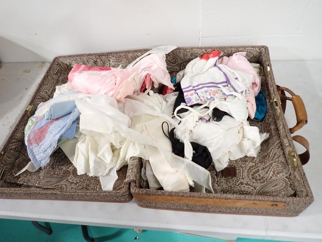 Vintage suitcase plus a lot of misc. lingerie / undergarments, etc.: Vintage suitcase plus a lot of misc. lingerie / undergarments, etc. suit case has trouble latching