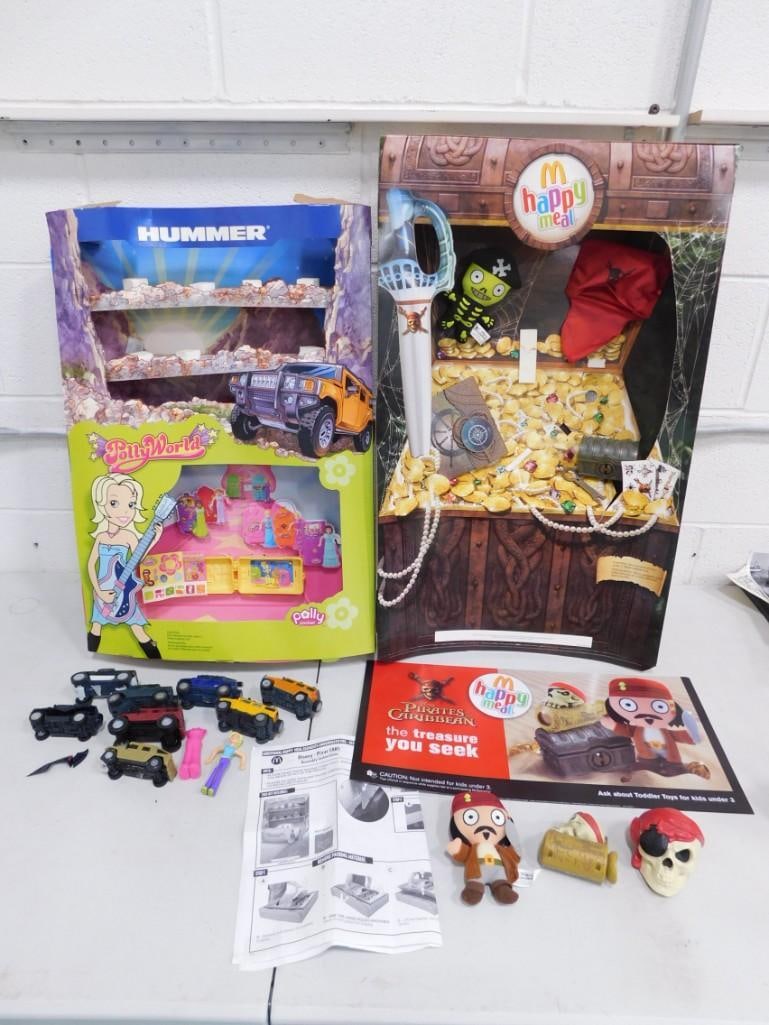 McDonalds Display Lot incl Polly Pocket, Hummer, Pirates of the Caribbean: 2 McDonald's Happy Meal displays. 1 Hummer is broken. These are not complete. includes everything that you see in the pictures