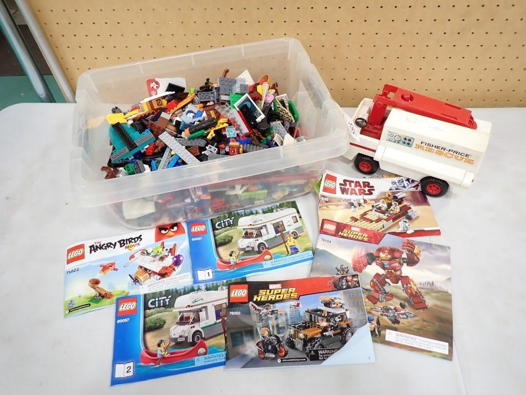 LEGO Bricks and Pieces, Instruction Booklets, and a Fisher Price Rescue Van: LEGO Bricks and Pieces, Instruction Booklets, and a Fisher Price Toy Rescue Van