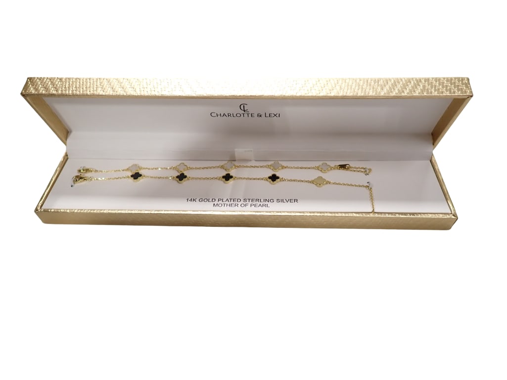 Charlotte & Lexi Sterling Silver with 14K Gold Plate and Mother of Pearl Bracelets: Charlotte & Lexi 14K Gold Plate over Sterling Silver with Mother of Pearl decorations Bracelets Live Auctioneers is now offering Live Shipping through them. This is an optional payment/shipping system