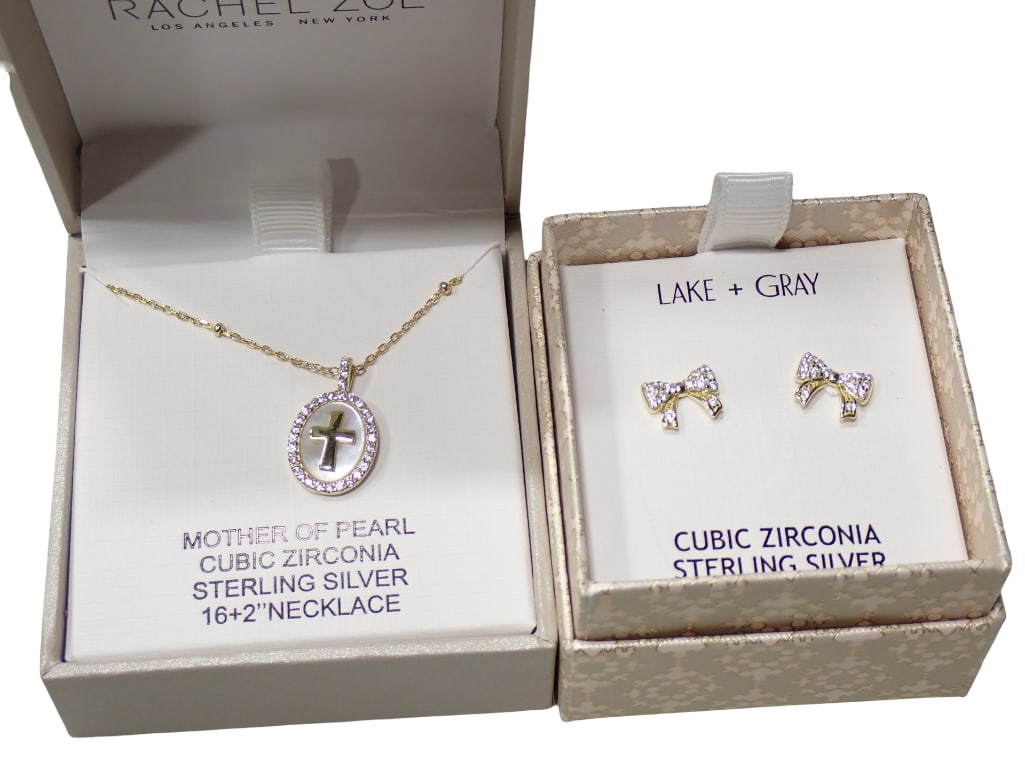 Sterling Silver Jewelry incl Cubic Zirconia & Sterling Bow Earrings and Mother of Pearl Cubic Zircon: Sterling Silver Jewelry incl Cubic Zirconia & Sterling Bow Earrings and Mother of Pearl Cubic Zirconia, and Sterling Silver Cross Necklace. Live Auctioneers is now offering Live Shipping through t