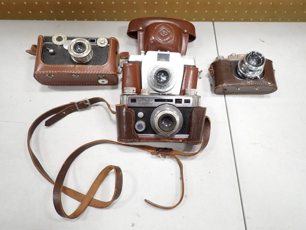 Lot of Vintage Camers with Leather Cases including Perfex Fifty Five, Argus: Lot of Vintage Camers with Leather Cases including Perfex Fifty Five, Argus, Halina Anastigmat Live Auctioneers is now offering Live Shipping through them. This is an optional payment/shipping system.