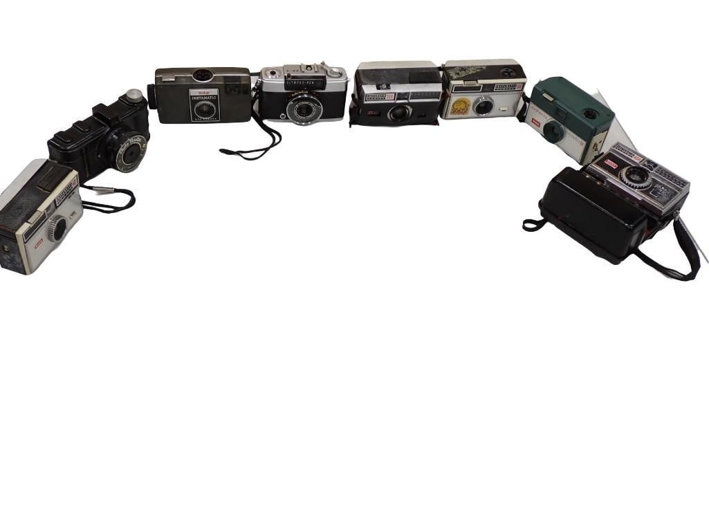 Lot of 8 Vintage Cameras including Kodak, Olympus, Hawkeye, Roto Master, etc.: Lot of 8 Vintage Cameras including Kodak, Olympus, Hawkeye, Roto Master, etc. Live Auctioneers is now offering Live Shipping through them. This is an optional payment/shipping system. If you would lik