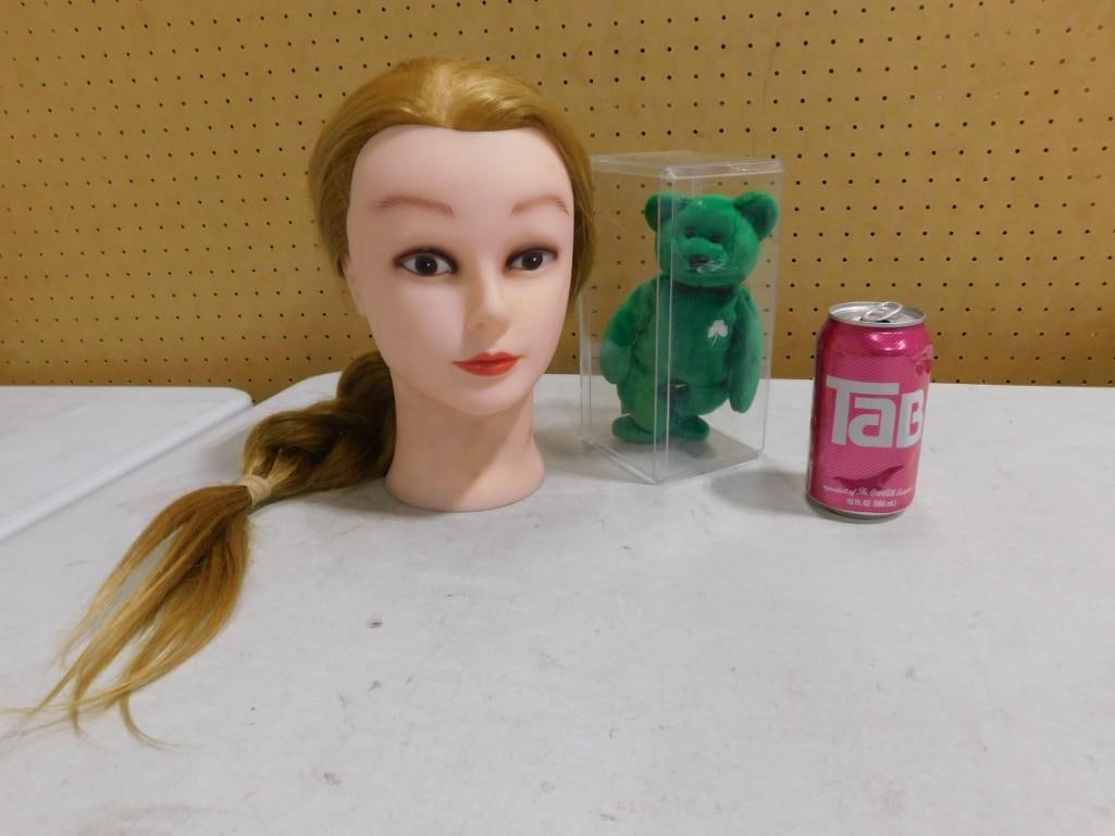 Mannequin Head and Erin Beanie Baby: Mannequin Head and Erin Beanie Baby 11x9x6" Live Auctioneers is now offering Live Shipping through them.? This is an optional payment/shipping system.? If you would like to use the UPS Store as